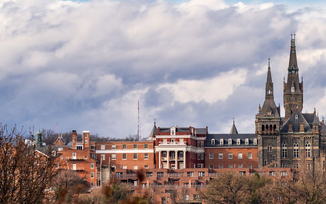 The spires of Georgetown University above the rooftops of Washington, DC