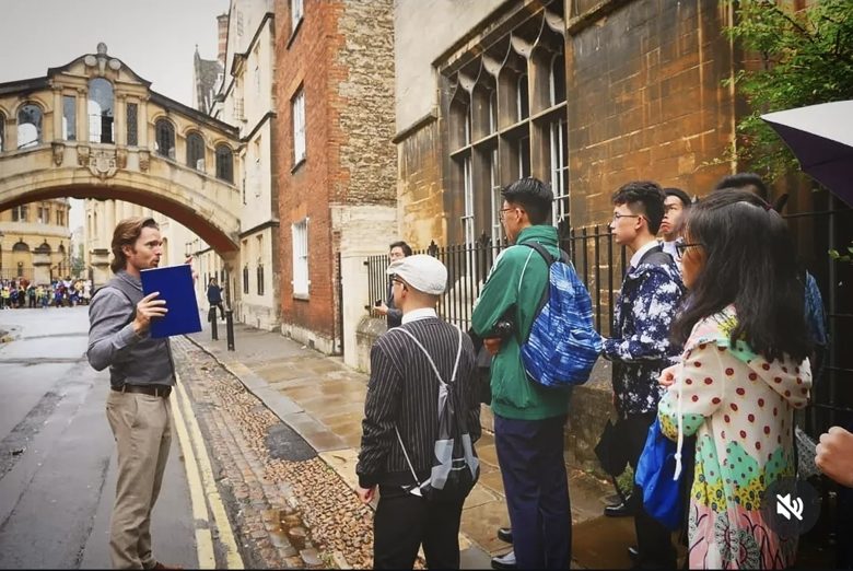 A Berndt Education teacher with students on a university visit
